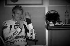 Neil Hodgson (Fila Ducati) relaxes in pits during winter testing